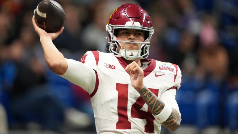 Jayden Maiava tosses a ball in warmup ahead of the Alamo Bowl.