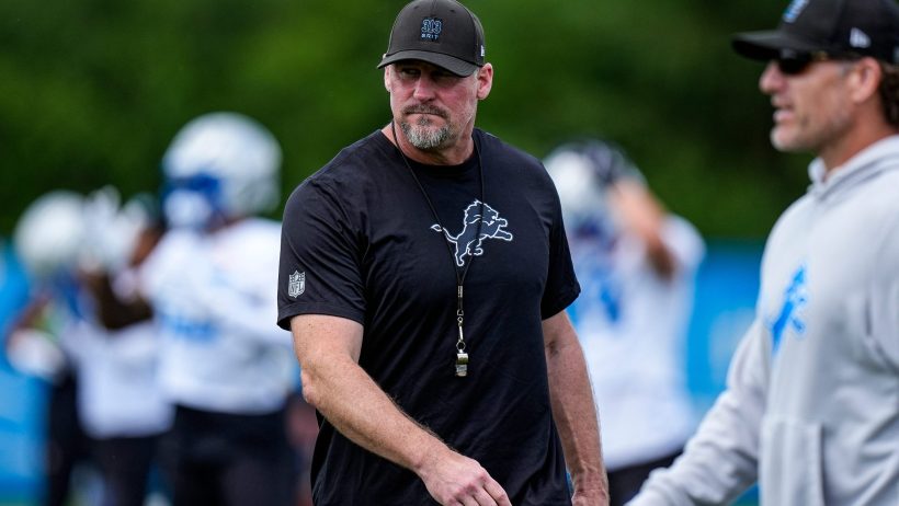 Dan Campbell patrols the field during a Lions Training Camp practice.