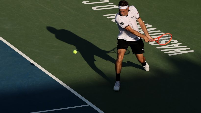 Taylor Fritz hitting a backhand