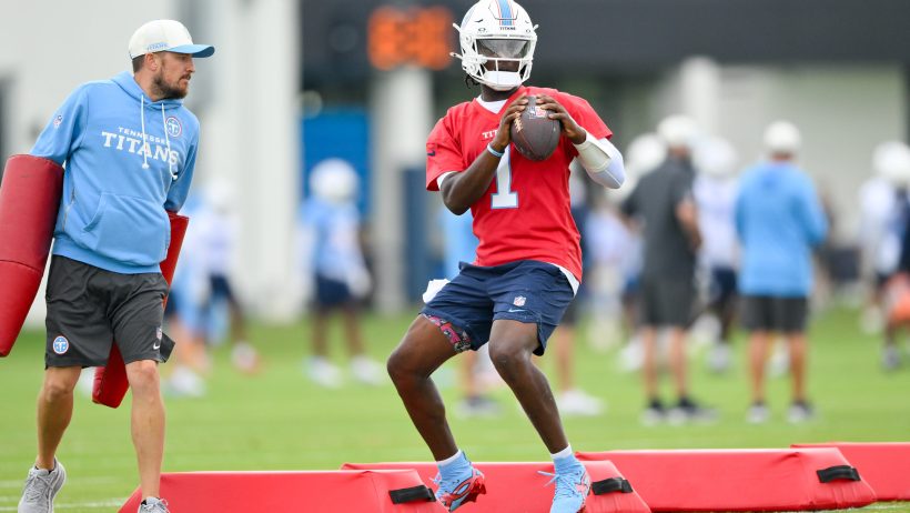 Cam Ward throwing a pass during training camp with the Tennessee Titans in the 2026 NFL preseason.