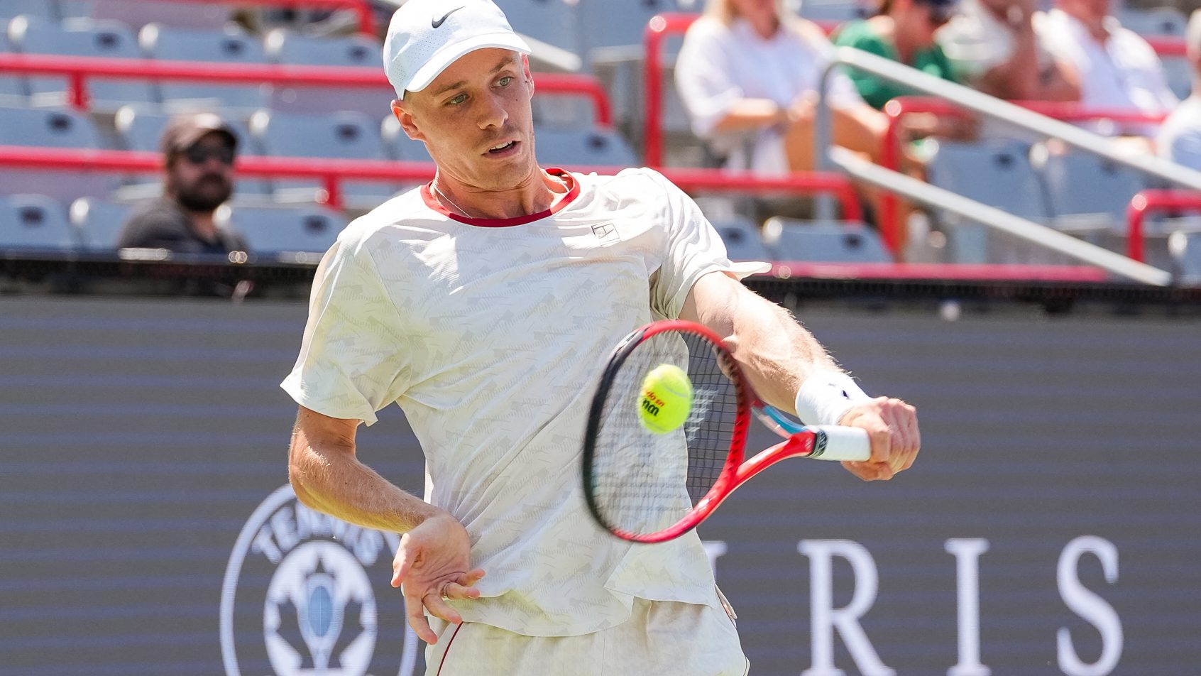 Denis Shapovalov hitting a backhand