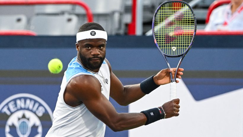 Frances Tiafoe returning ball