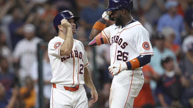 The Astros celebrate a home run versus the Blue Jays.