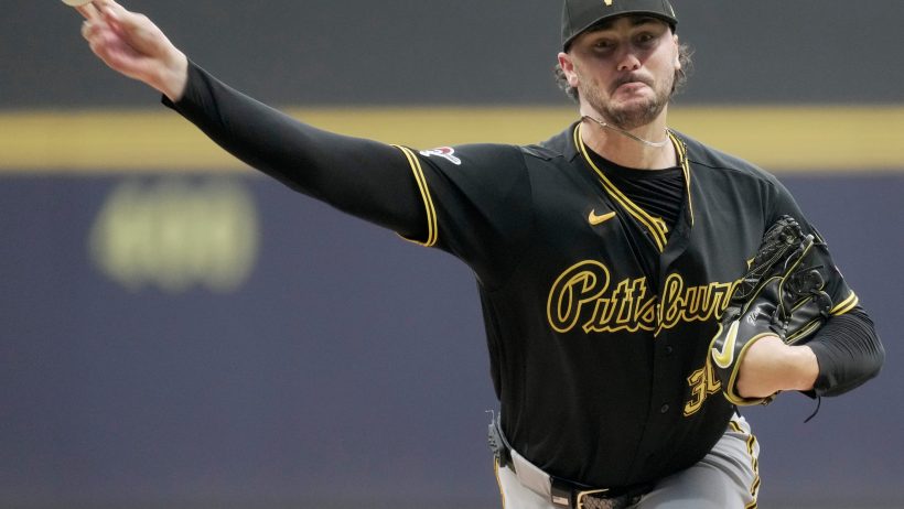 Paul Skenes throws a baseball