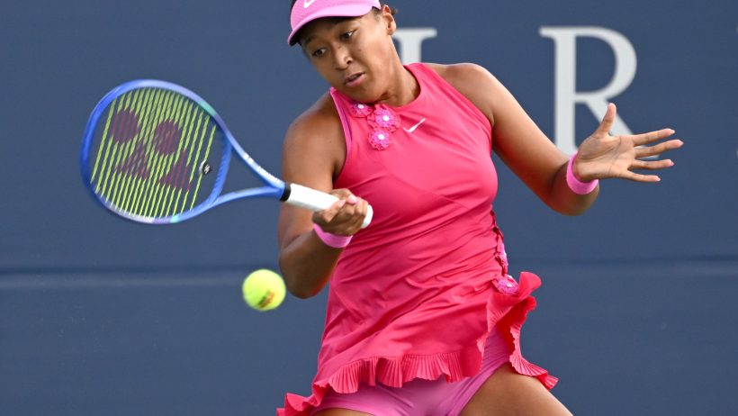 Naomi Osaka hitting a forehand