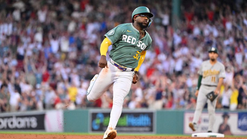Andruw Monasterio rounds the bases after a Red Sox home run versus the Athletics.