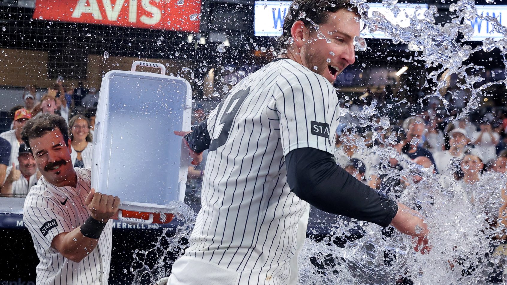 Austin Wells is showered after a Yankees victory.