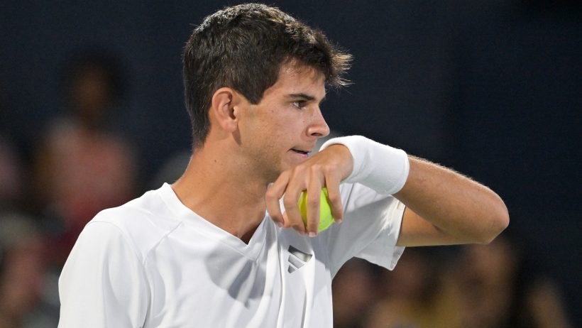 Rafael Jodar patting down face with wristband