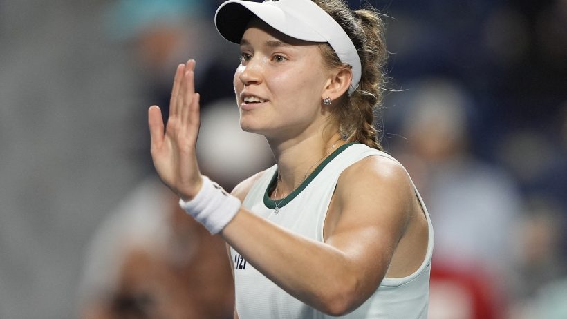 Elena Rybakina waving left hand
