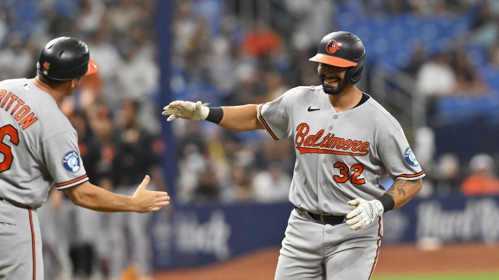 The Orioles celebrate a home run vs the Rays.