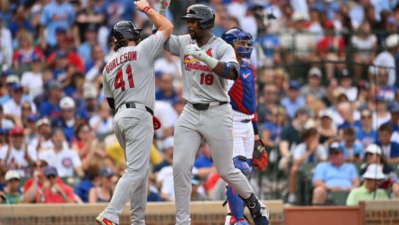 St. Louis Cardinals right fielder Jordan Walker celebrates with first baseman Alec Burleson