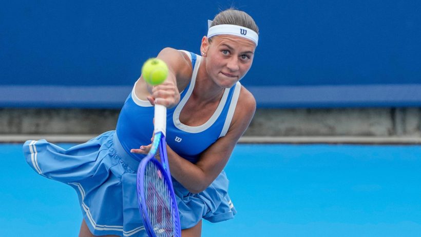 Marta Kostyuk serves at the WTA Cincinnati Open.