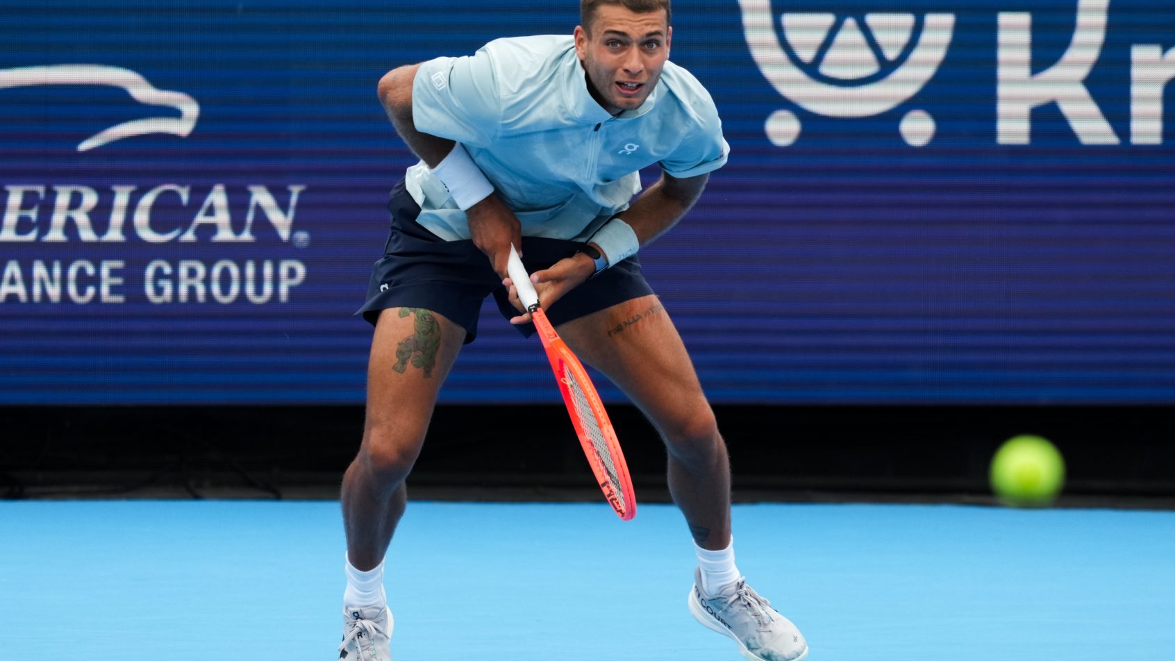 Flavio Cobolli returns serve