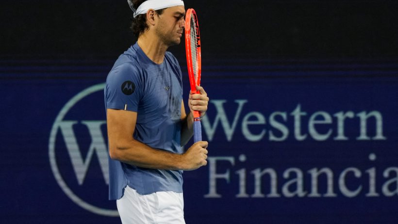 Taylor Fritz racket over face