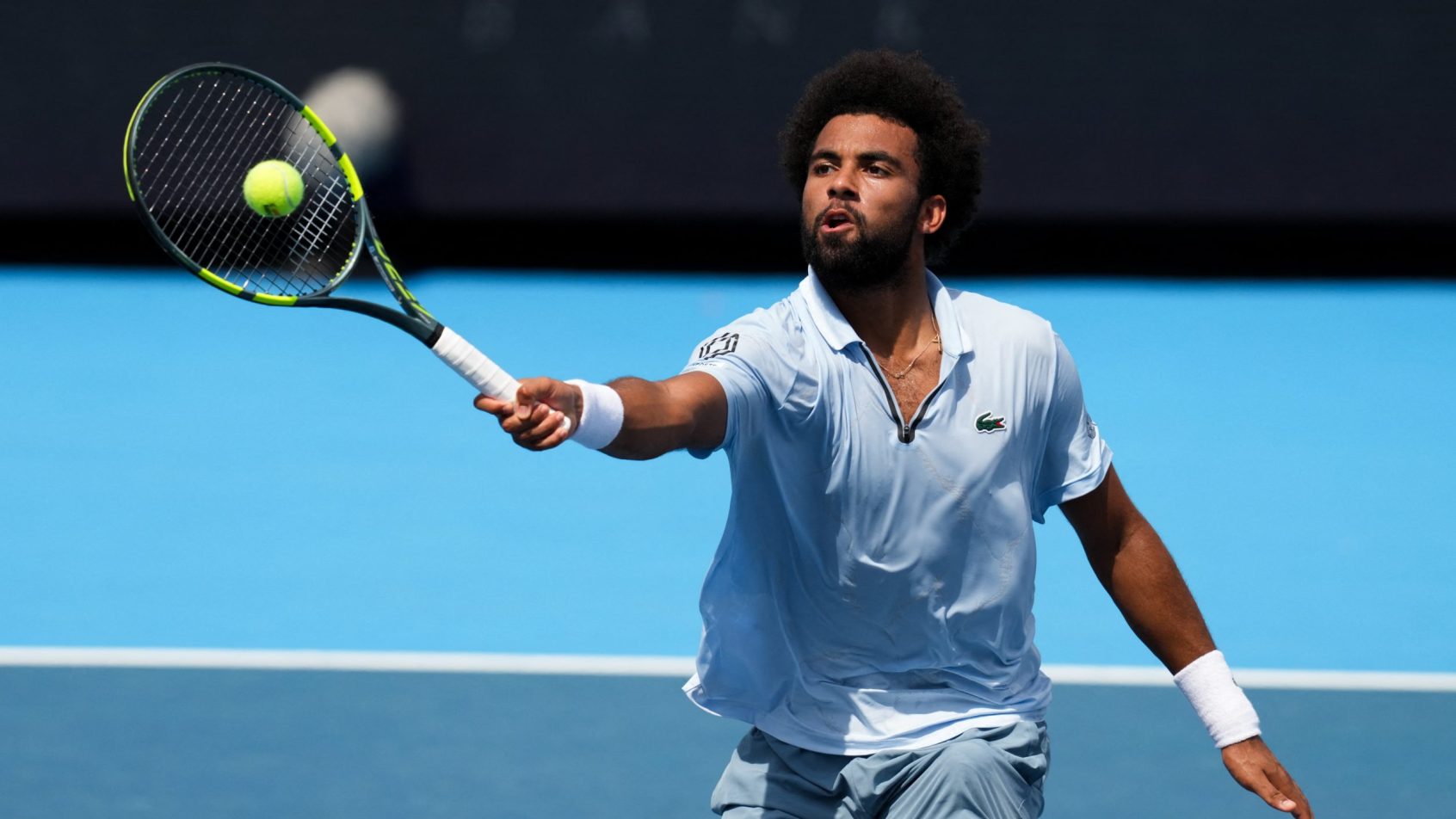 Arthur Fils hits a volley winner during a match at the Cincinnati Open.