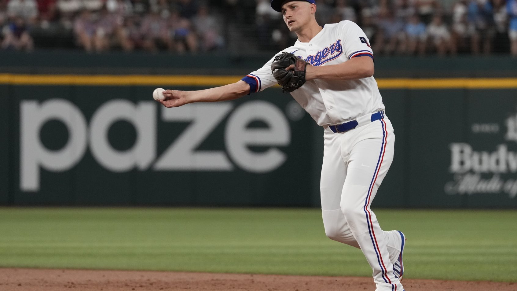 Corey Seager throws the baseball.