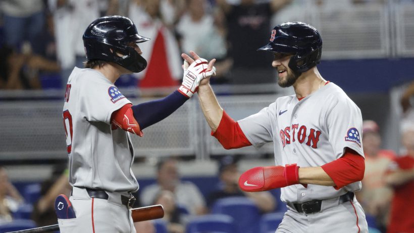 The Red Sox celebrate a home run vs the Marlins.
