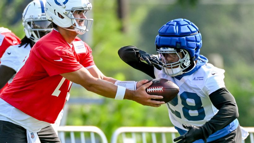 Jonathan Taylor taking handoff from Daniel Jones. The Running Back Cliff.