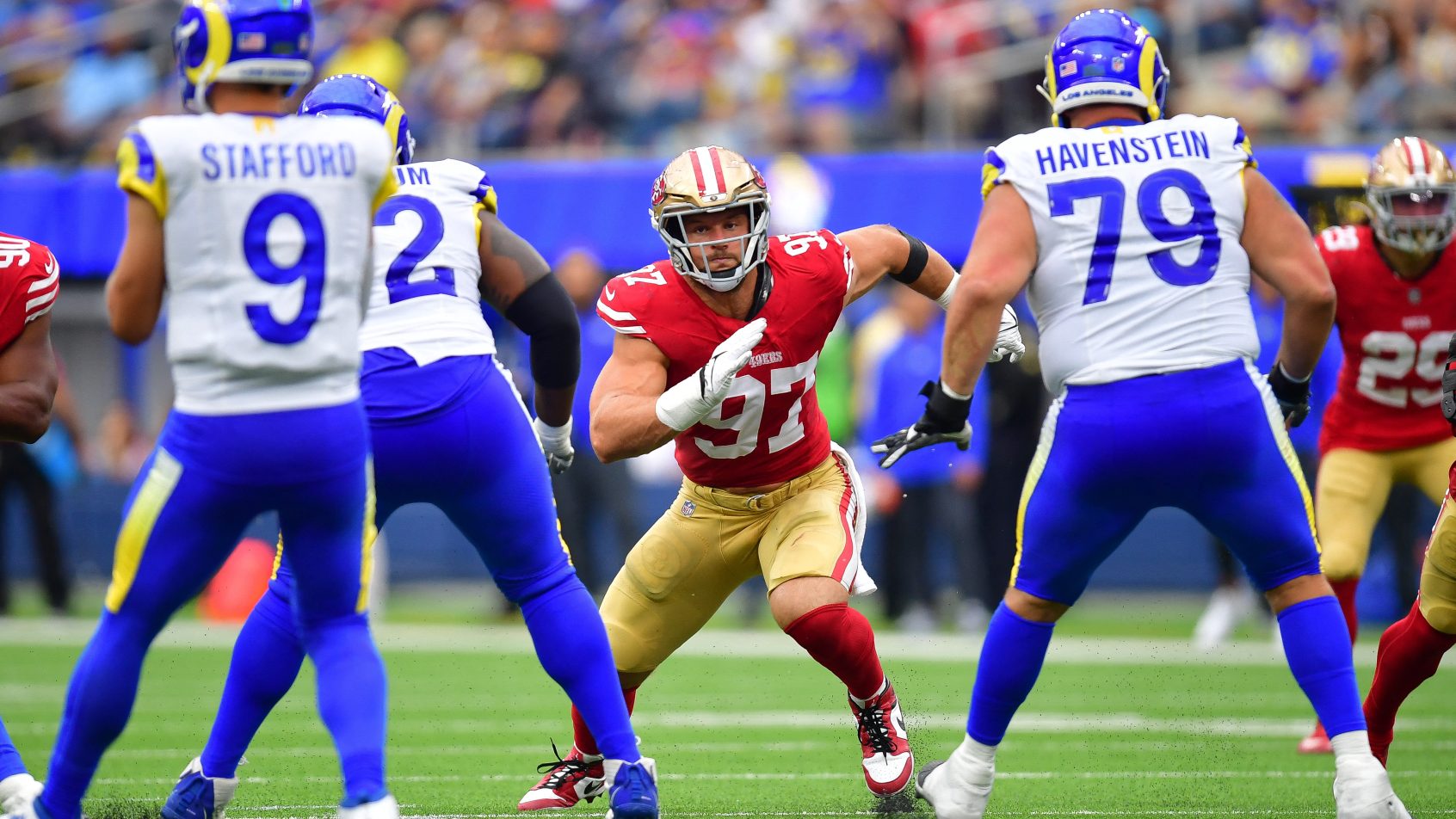 Nick Bosa tries to tack Matt Stafford