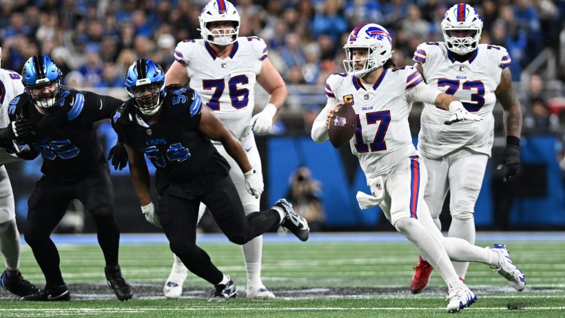Josh Allen running away from the defence.