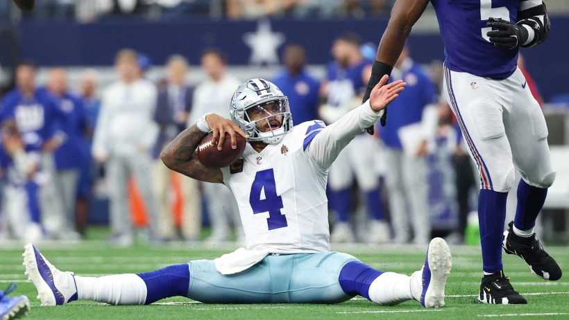 Dak Prescott celebrates a first down.