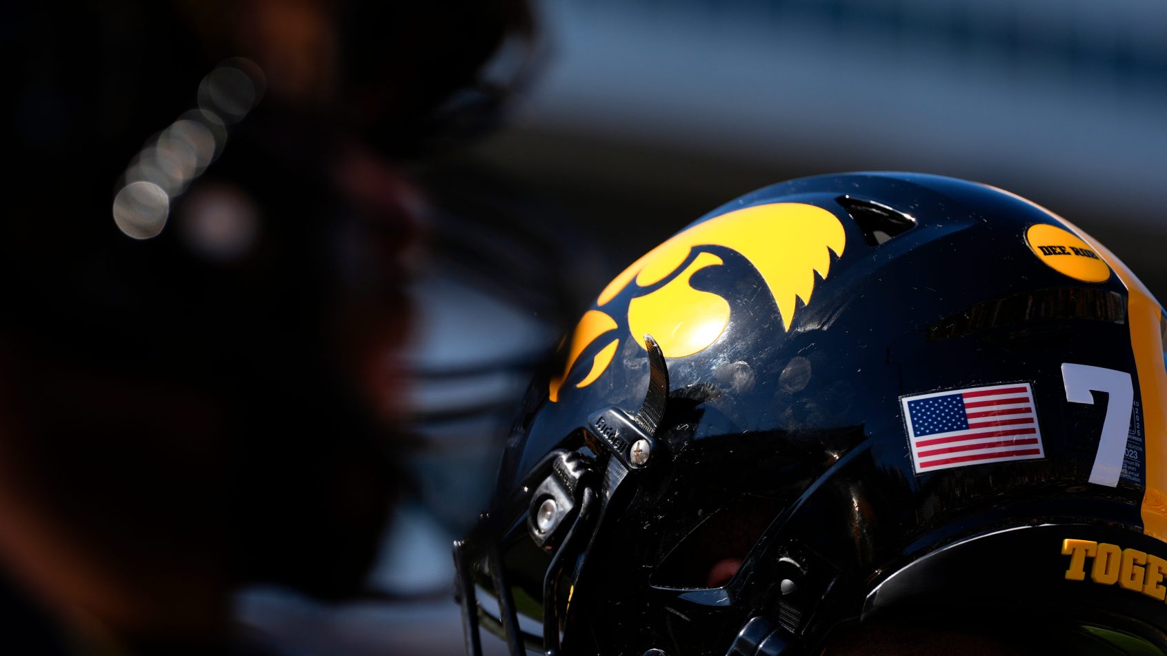 The Iowa Hawkeyes logo is pictured on a helmet during warmups before a football game against the Indiana Hoosiers Sept. 27, 2025