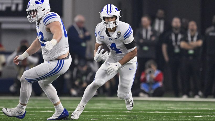 BYU Cougars running back LJ Martin runs the ball.