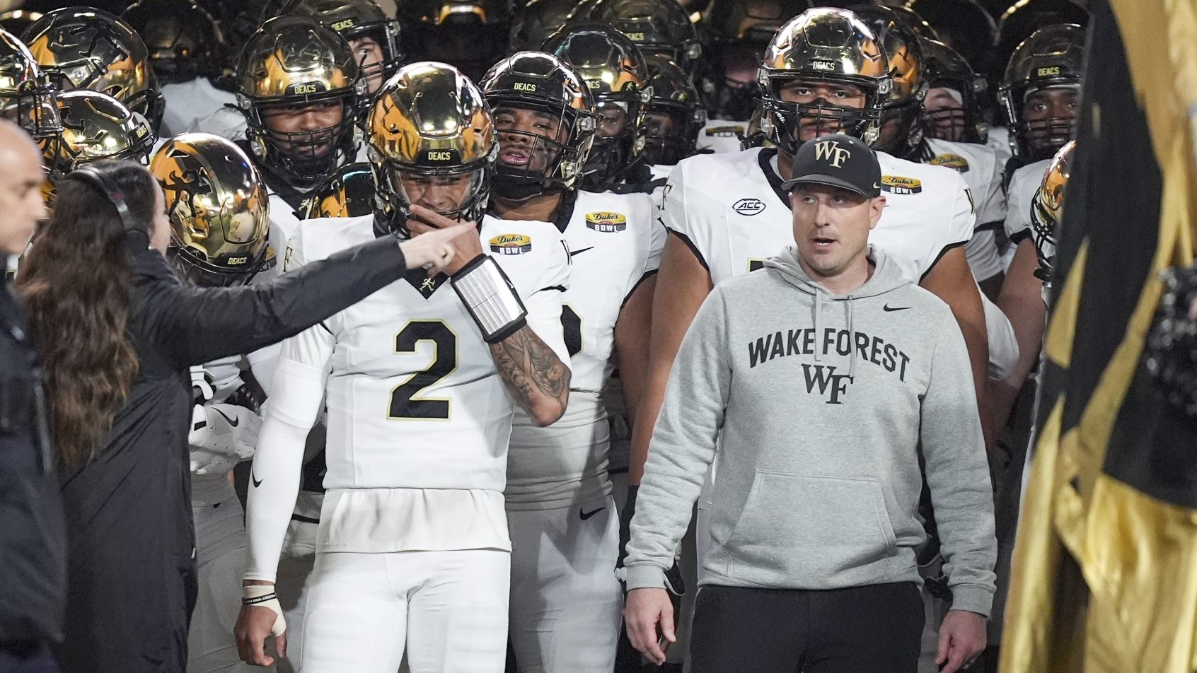 Wake Forest football players waiting to come out of tunnel.