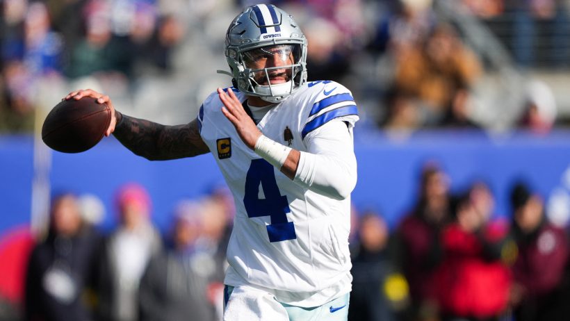 Dak Prescott throwing ball