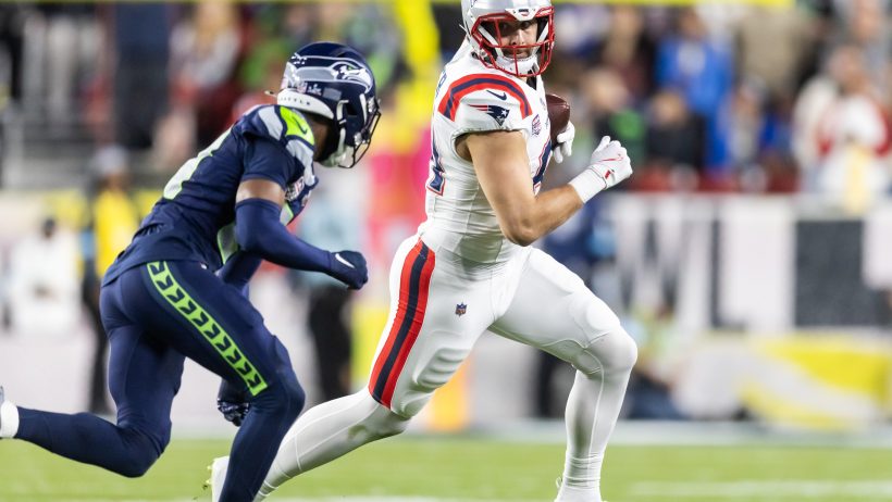 New England Patriots tight end Hunter Henry carries the ball