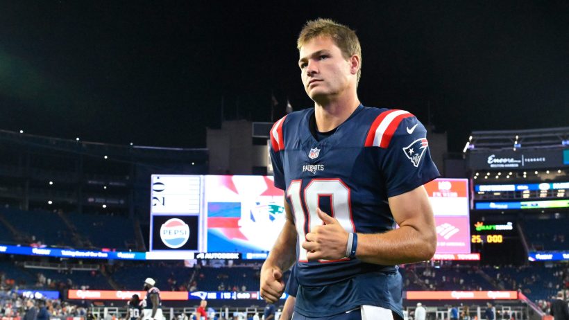Drake Maye jogs off the field after a Patriots preseason game.