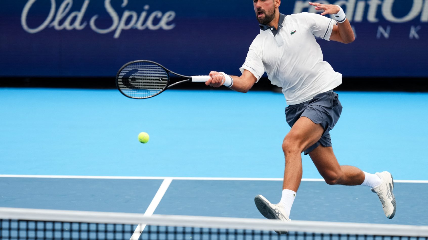 Novak Djokovic hitting a forehand