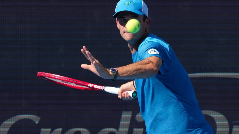 Tommy Paul preparing to hit forehand