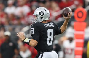Las Vegas Raiders quarterback Kirk Cousins throwing a pass