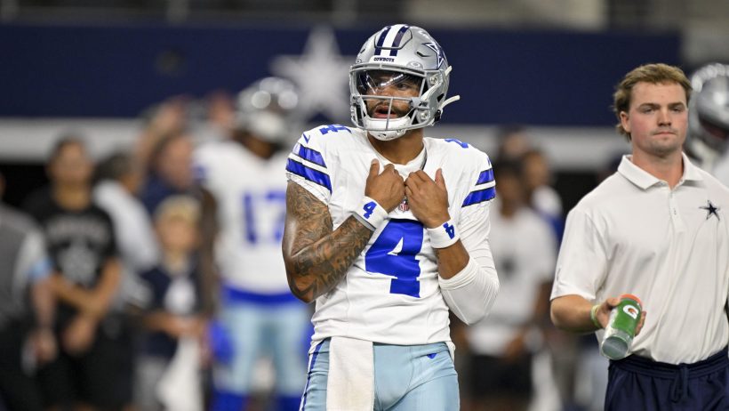 Dak Prescott on the sidelines during a Cowboys preseason game.