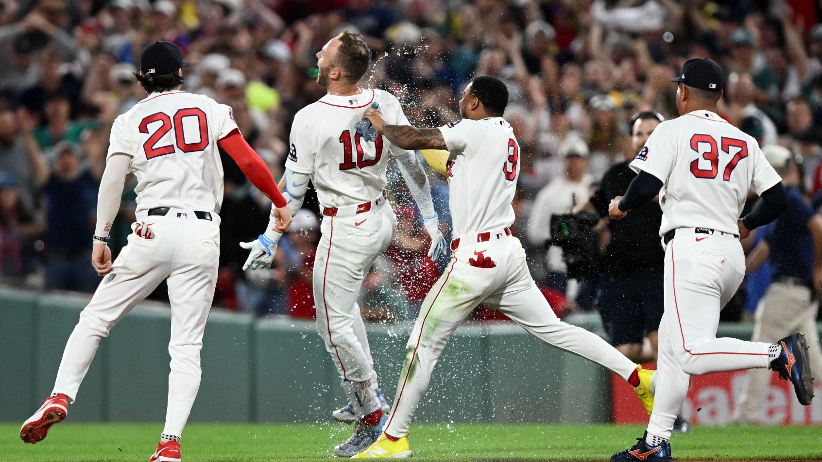The Boston Red Sox celebrate together.