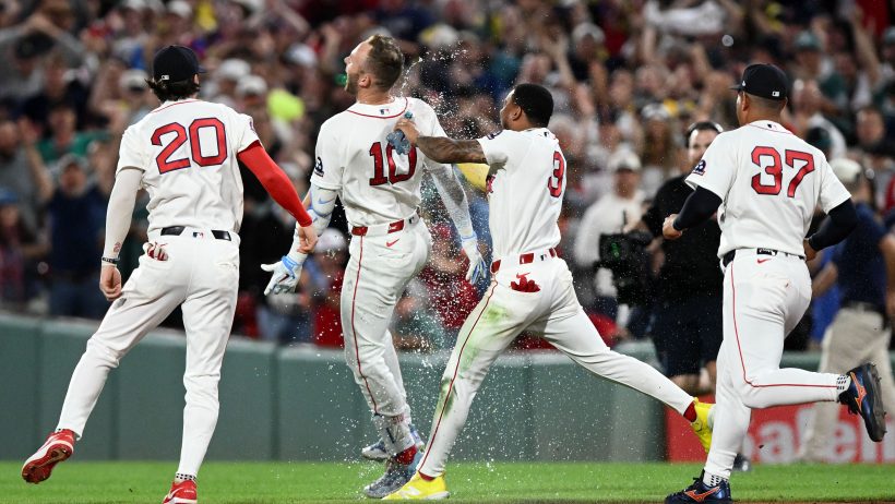 The Boston Red Sox celebrate together.
