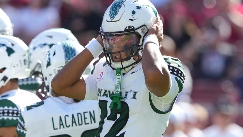 Micah Alejado hands covering earholes on helmet