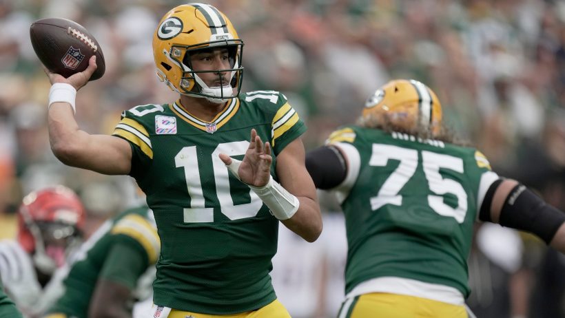 Green Bay Packers quarterback Jordan Love throwing a pass