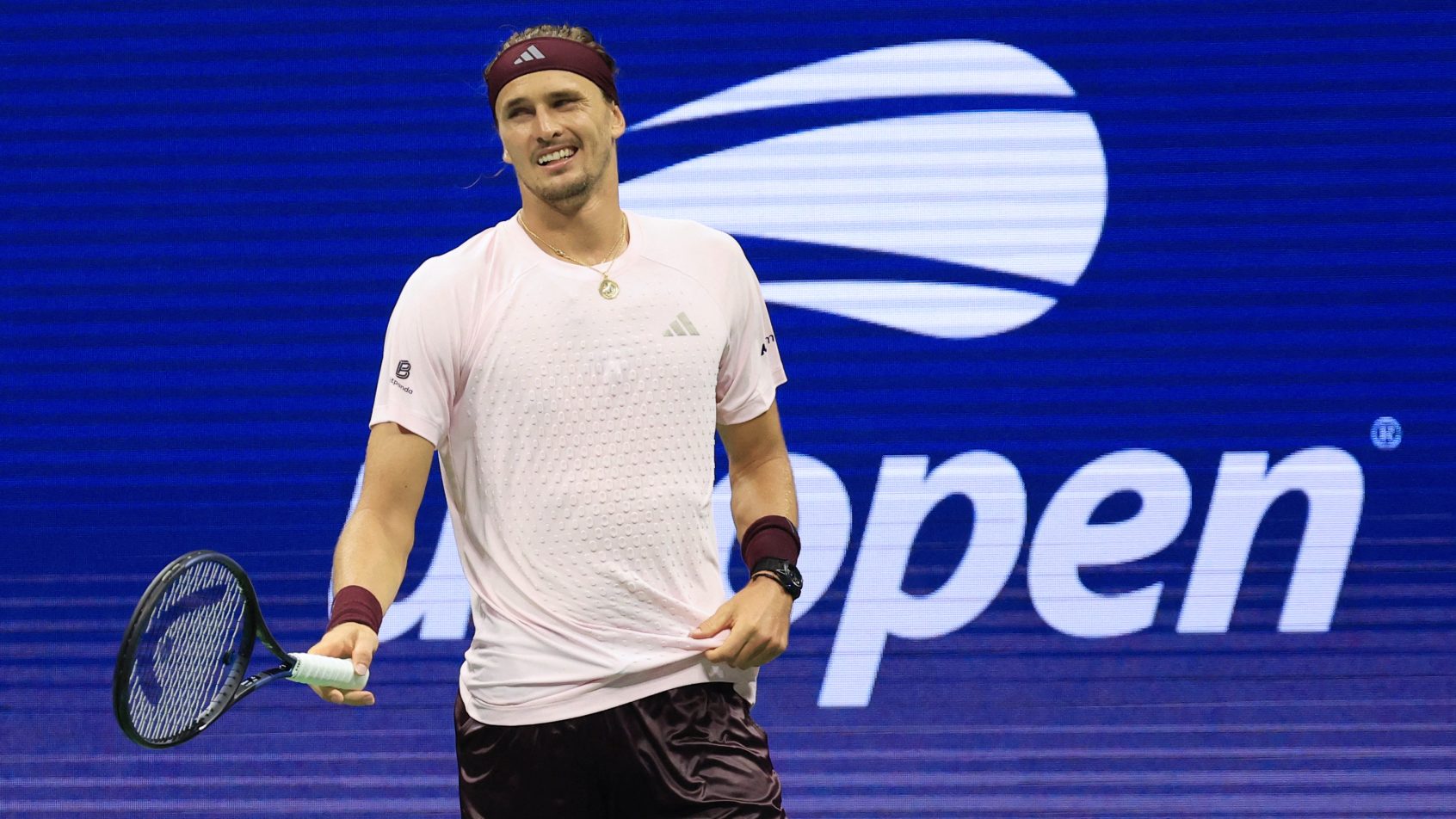 Alexander Zverev smiles during a recent US Open victory.