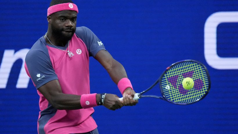 Frances Tiafoe hitting a backhand