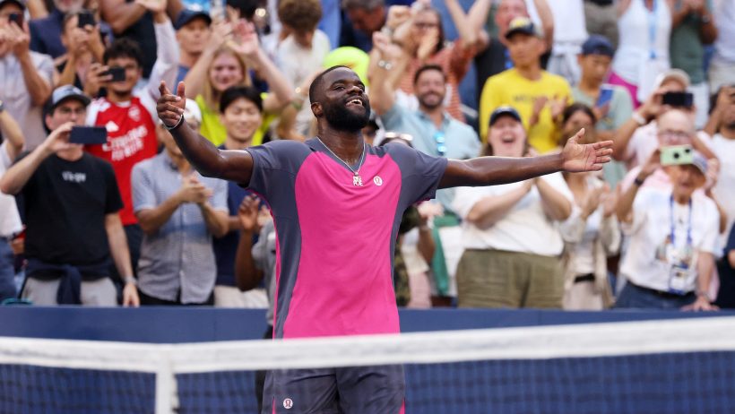 Frances Tiafoe arms out celebration