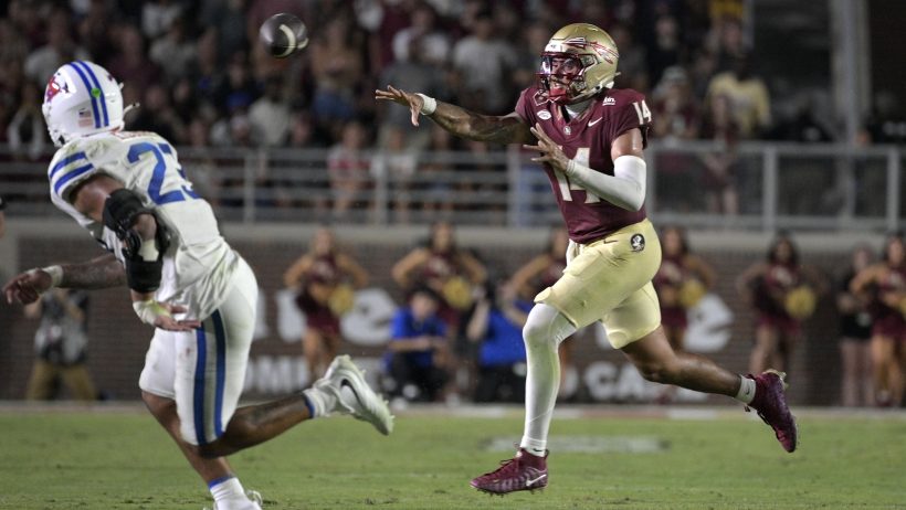 Ashton Daniels throws on the run for Florida State.