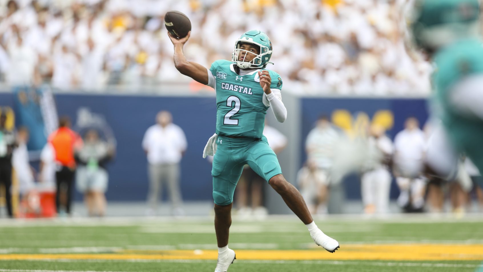 Deuce Bailey throws on the run vs West Virginia.
