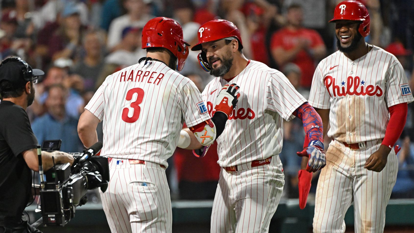 The Phillies celebrate a Kyle Schwarber home run.
