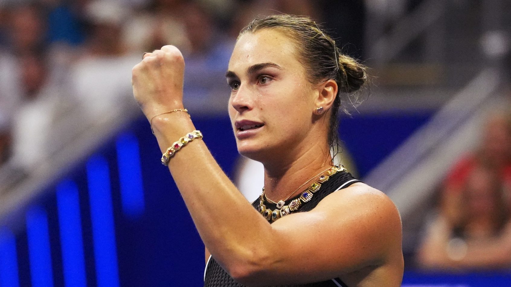 Aryna Sabalenka celebrates a US Open semifinal win.