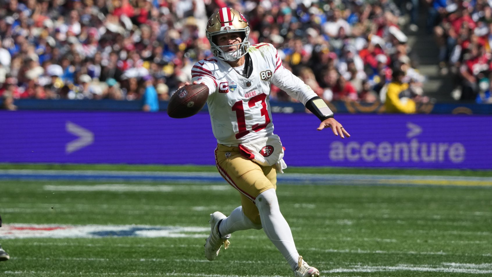 San Francisco 49ers quarterback Brock Purdy running with the ball