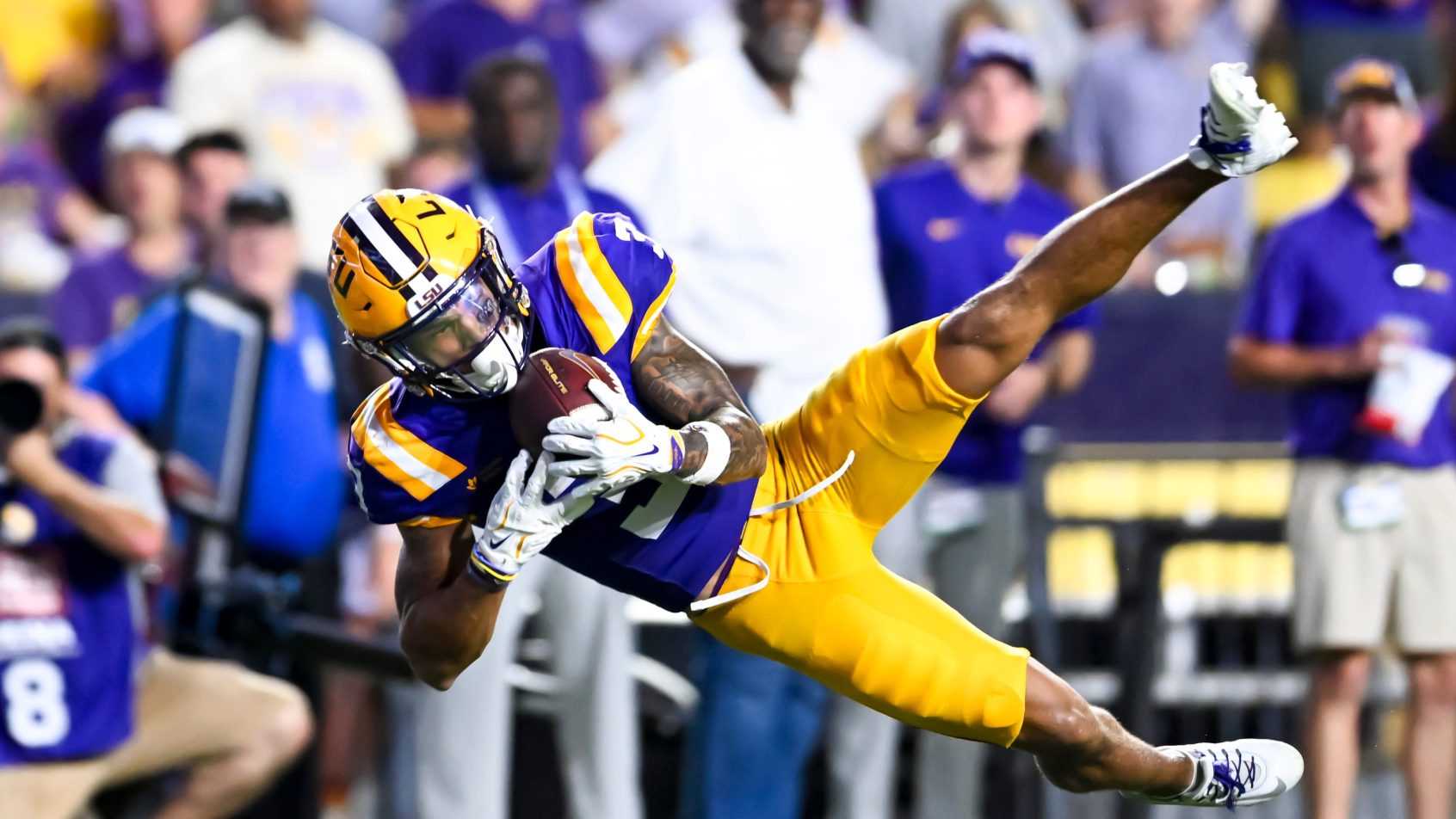 Eugene Wilson III makes a diving catch vs LA Tech.