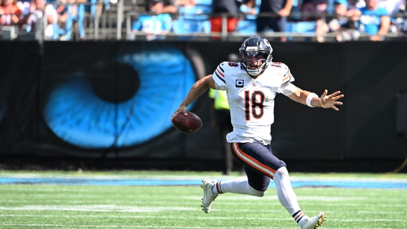 Chicago Bears quarterback Caleb Williams running with the ball