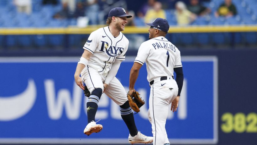 The Rays celebrate following a victory over the Athletics.